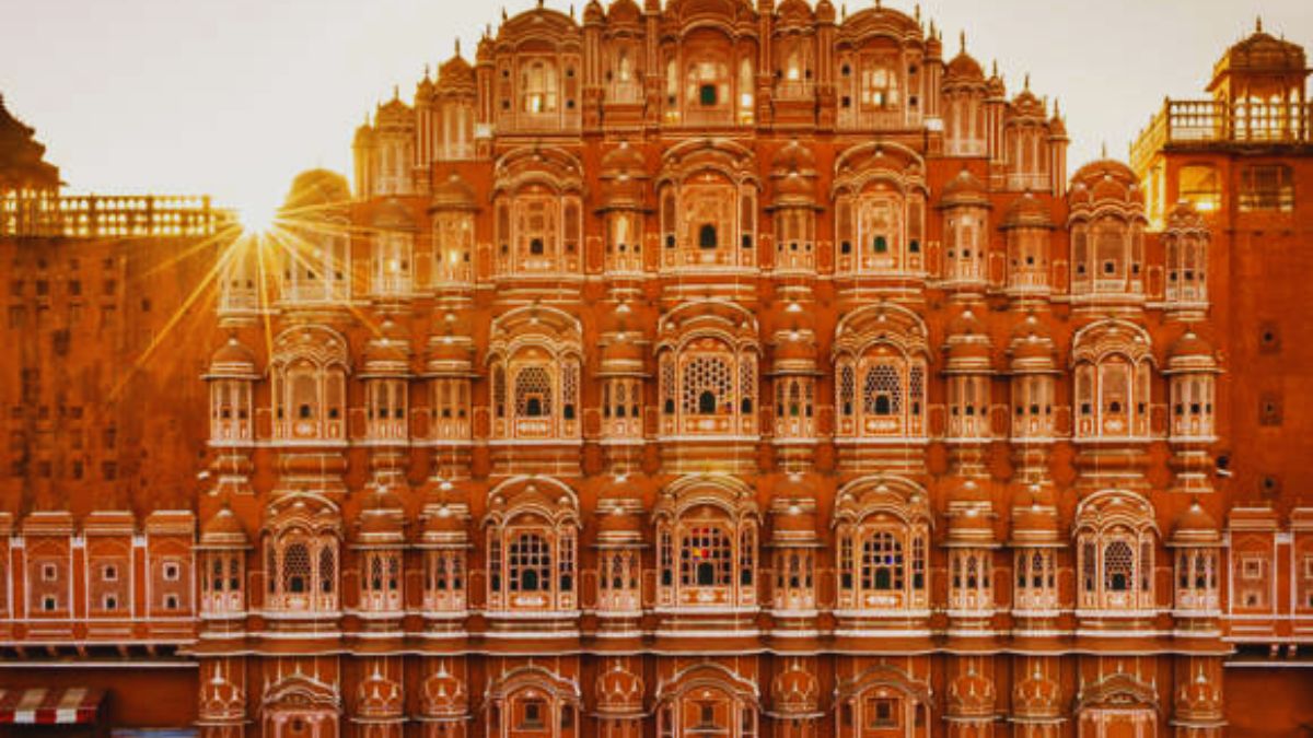 4. Jaisalmer: Golden Sands Under Winter Sun
Trading mountains for deserts, Jaisalmer offers a completely different winter experience just 800 kilometers from Delhi. Winter is undoubtedly the best time to explore this golden city, as summer temperatures become unbearable. The magnificent Jaisalmer Fort, crafted from yellow sandstone, glows beautifully under the winter sun. Experience camel safaris across the Sam Sand Dunes, spend nights in desert camps under star-studded skies, and explore intricately carved havelis. The pleasant winter temperatures, ranging from 7°C to 24°C, make desert exploration comfortable and enjoyable.